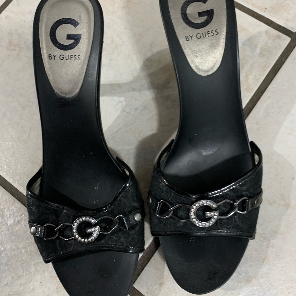 Black Guess open back squashed heels.